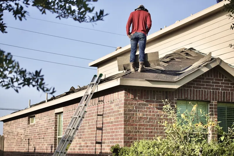 Professional roofer working on a residential roof in Comical Corners